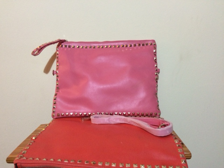 Pink and Orange Studded clutch bag